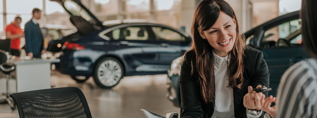A stock photo of a person working with a dealership.